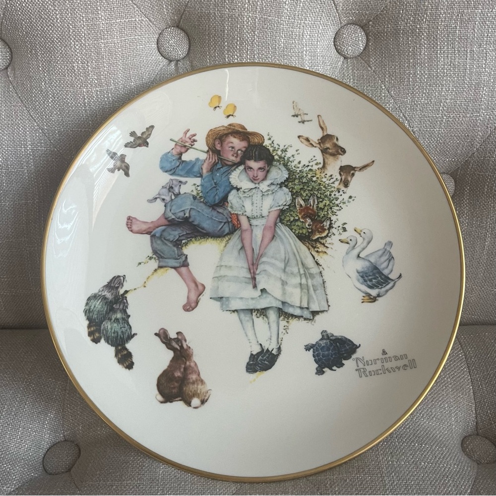 Norman Rockwell Plate w/Gold and Multicolor Design 
Spring - sweet song so young